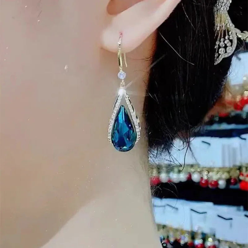 Boucles d’oreilles pendantes classiques bleues pour femme
