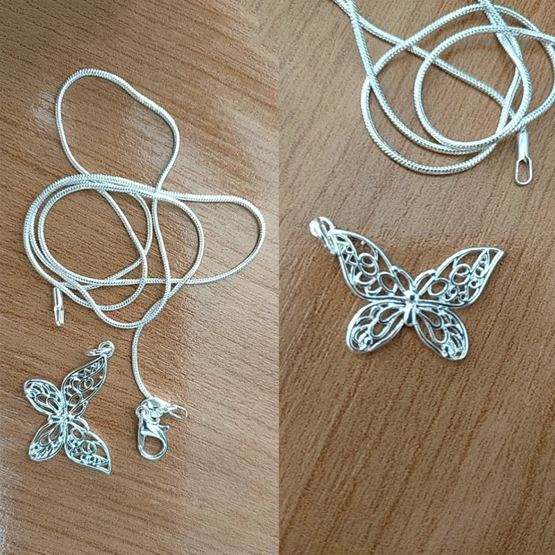 Sterling silver butterfly pendant necklace with filigree charm”