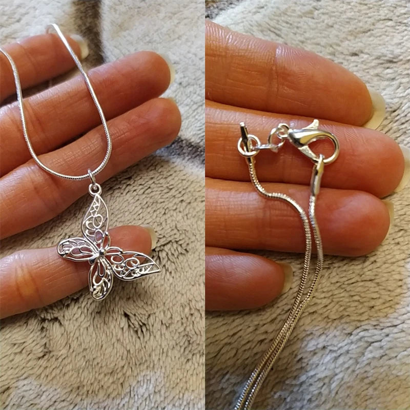 Sterling silver butterfly pendant necklace with filigree charm”