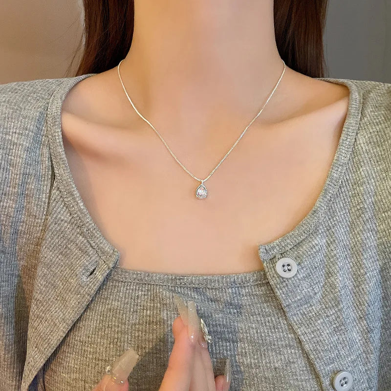 Sterling silver necklace with teardrop crystal pendant – minimalist elegance”