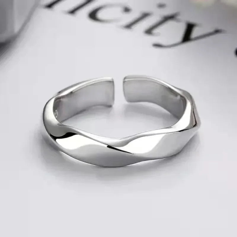 Set of minimalist silver knuckle rings including chunky band and beaded midi ring”