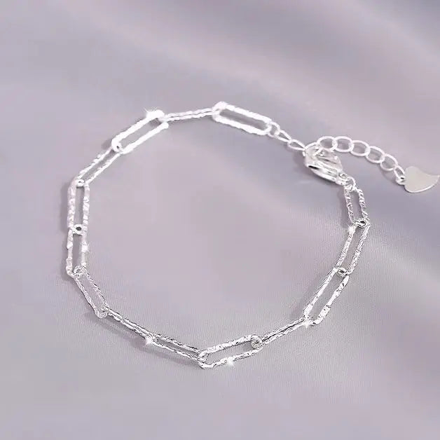 “Adjustable silver bead bracelet with sliding clasp minimalist design