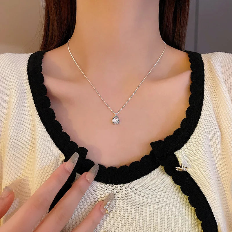 Sterling silver necklace with teardrop crystal pendant – minimalist elegance”
