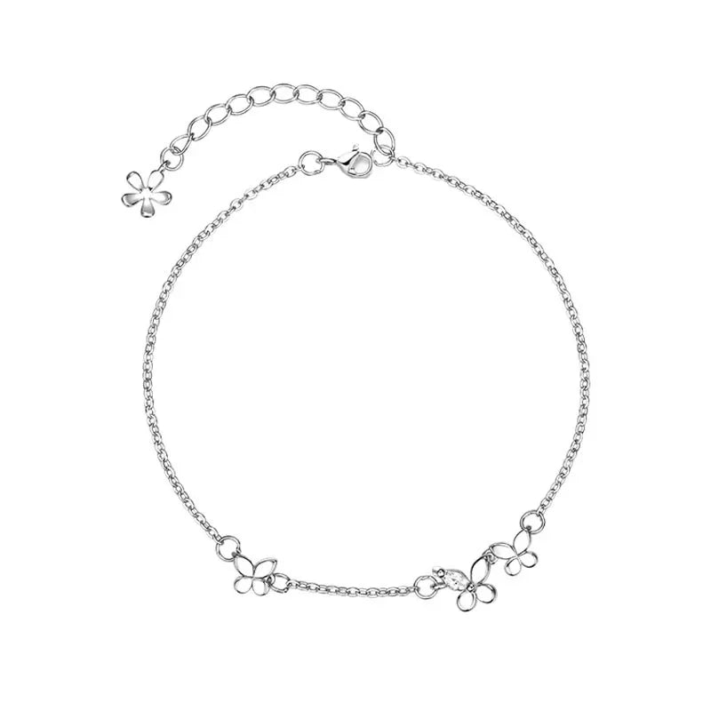 Minimalist silver chain bracelet with dainty butterfly charms