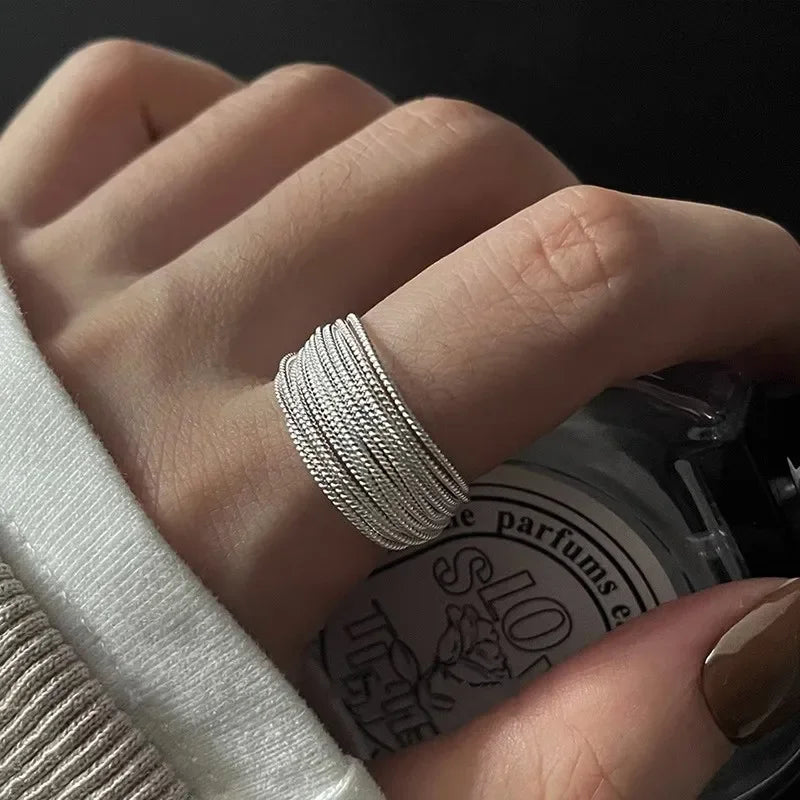 Set of minimalist silver knuckle rings including chunky band and beaded midi ring”