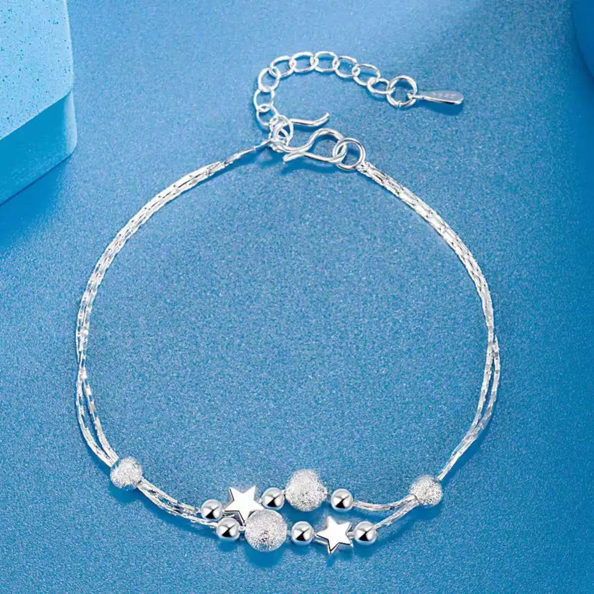 “Adjustable silver bead bracelet with sliding clasp minimalist design