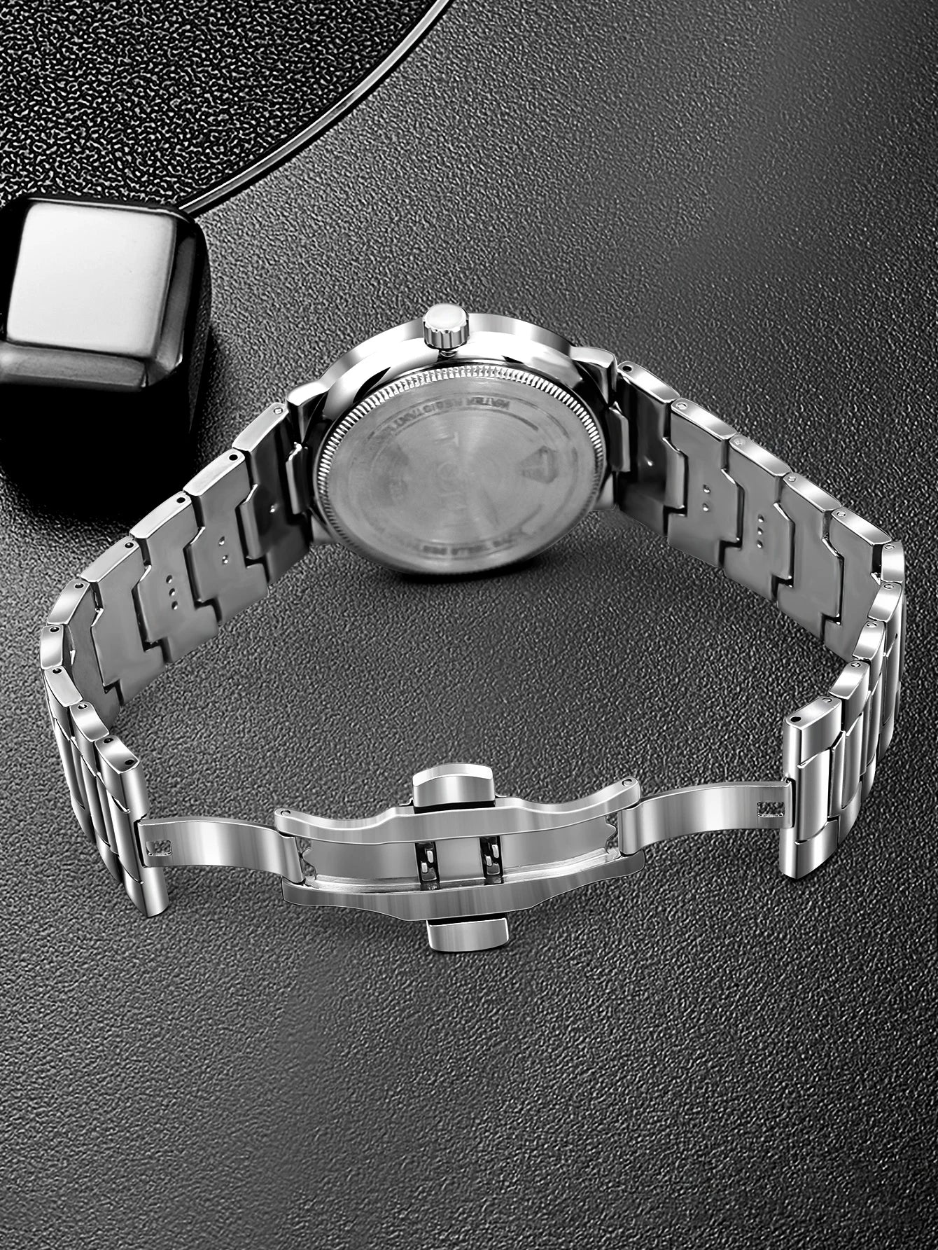 TOMI men’s blue dial minimalist watch with stainless steel bracelet and date display