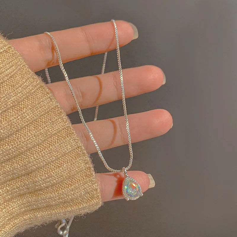 Sterling silver necklace with teardrop crystal pendant – minimalist elegance”