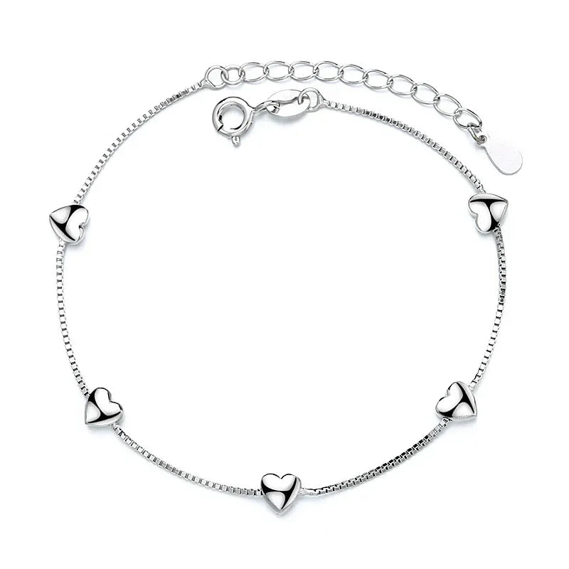 Minimalist silver chain bracelet with dainty butterfly charms
