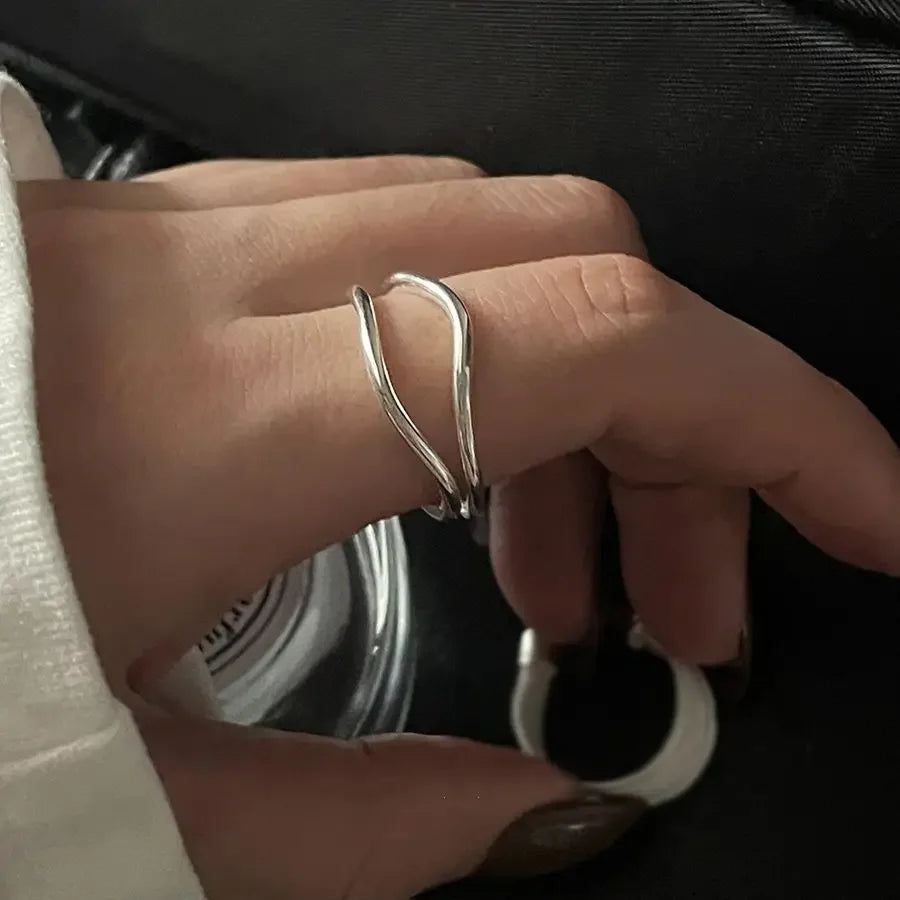 Set of minimalist silver knuckle rings including chunky band and beaded midi ring”