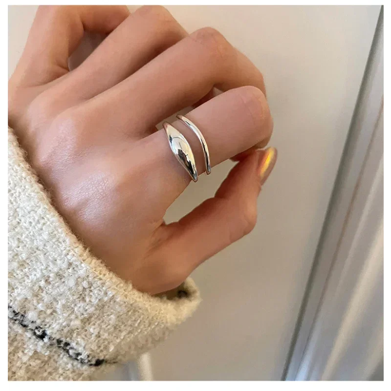 Set of minimalist silver knuckle rings including chunky band and beaded midi ring”