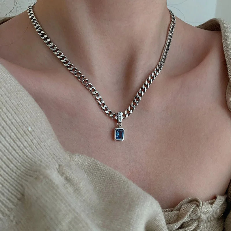 Chunky chain necklace with blue gem pendant for modern fashion