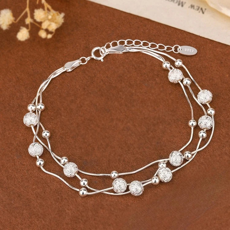 “Adjustable silver bead bracelet with sliding clasp minimalist design