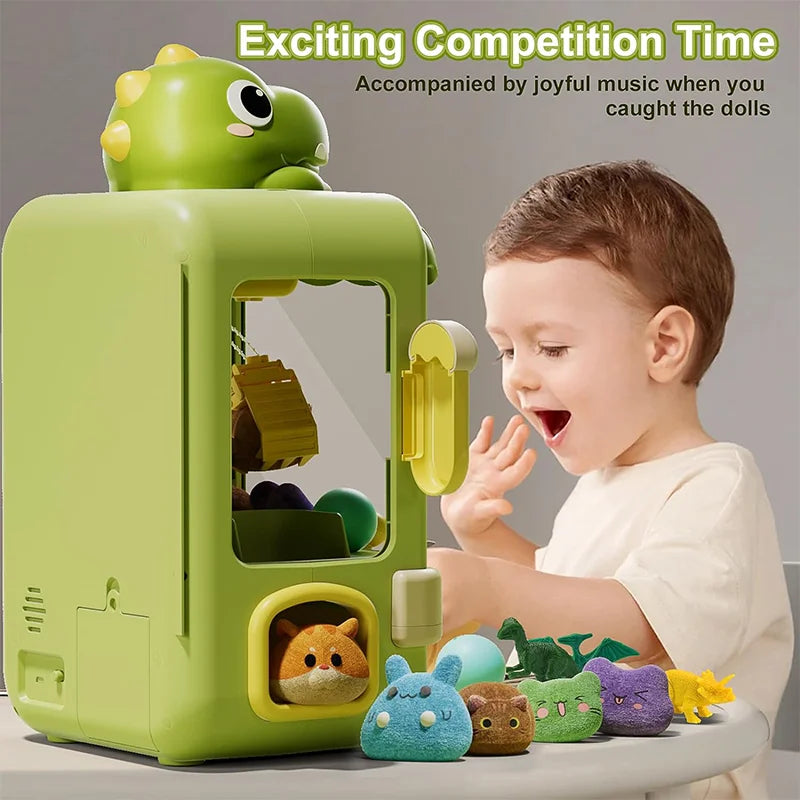 Mini claw machine toy for kids with dinosaur design and plush prizes”