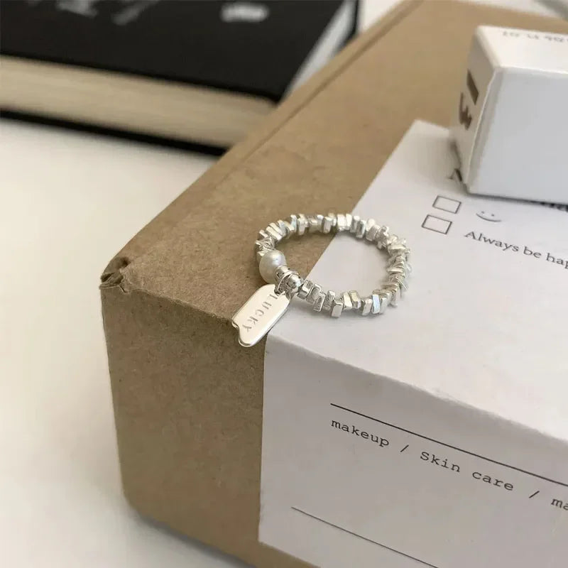 Set of minimalist silver knuckle rings including chunky band and beaded midi ring”