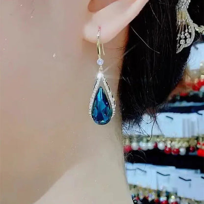 Boucles d’oreilles pendantes classiques bleues pour femme