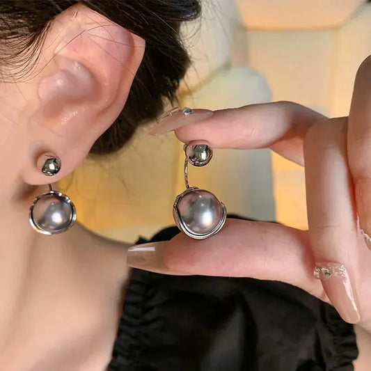 Boucles d'oreilles élégantes en perles grises