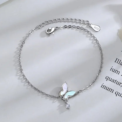 Minimalist silver chain bracelet with dainty butterfly charms