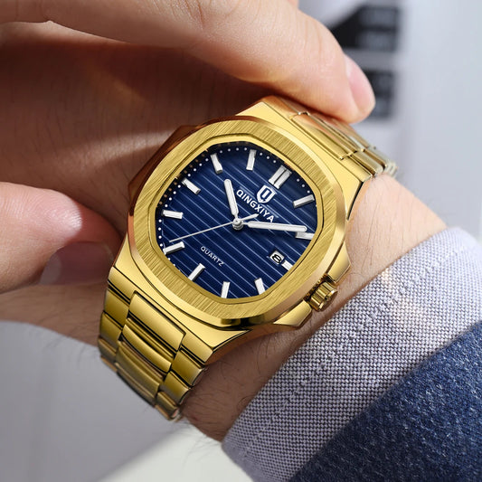 Qingxia gold blue Nautilus quartz watch with blue textured dial and gold link bracelet