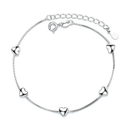 Minimalist silver chain bracelet with dainty butterfly charms