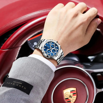 Luxury men’s blue chronograph watch with stainless steel bracelet, sporty dial, and multi-subdial features”