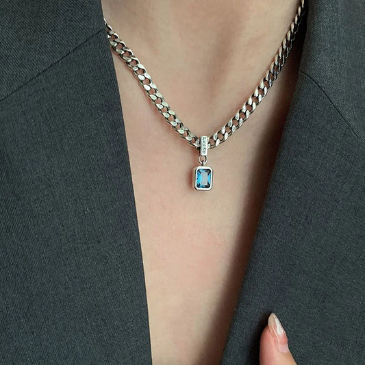 Chunky chain necklace with blue gem pendant for modern fashion